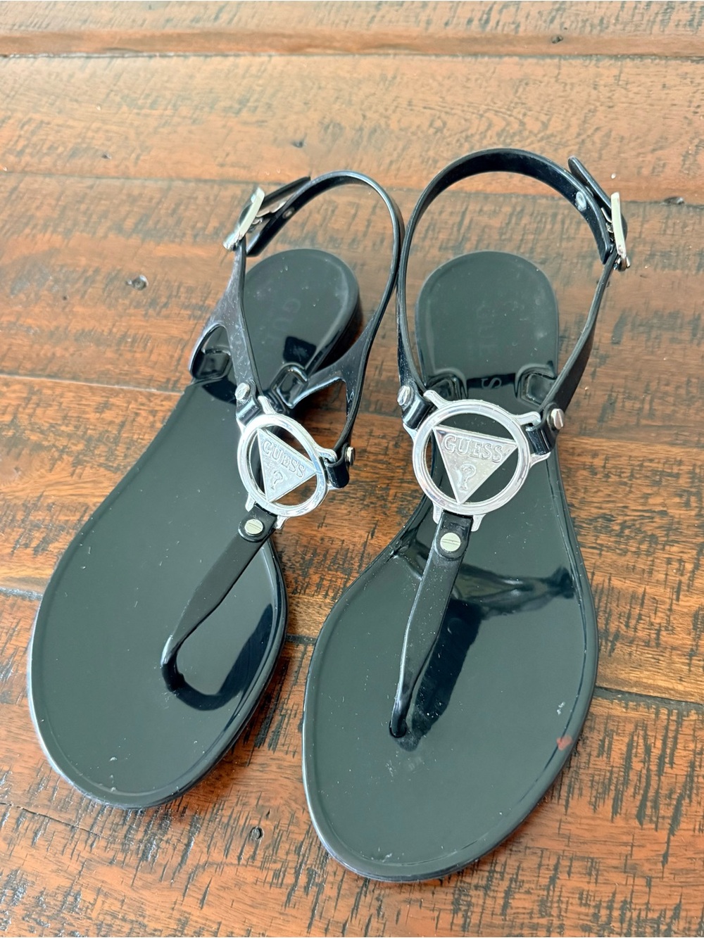 Guess Black Patent T-Strap Sandals with Silver Logo Medallion SZ.8